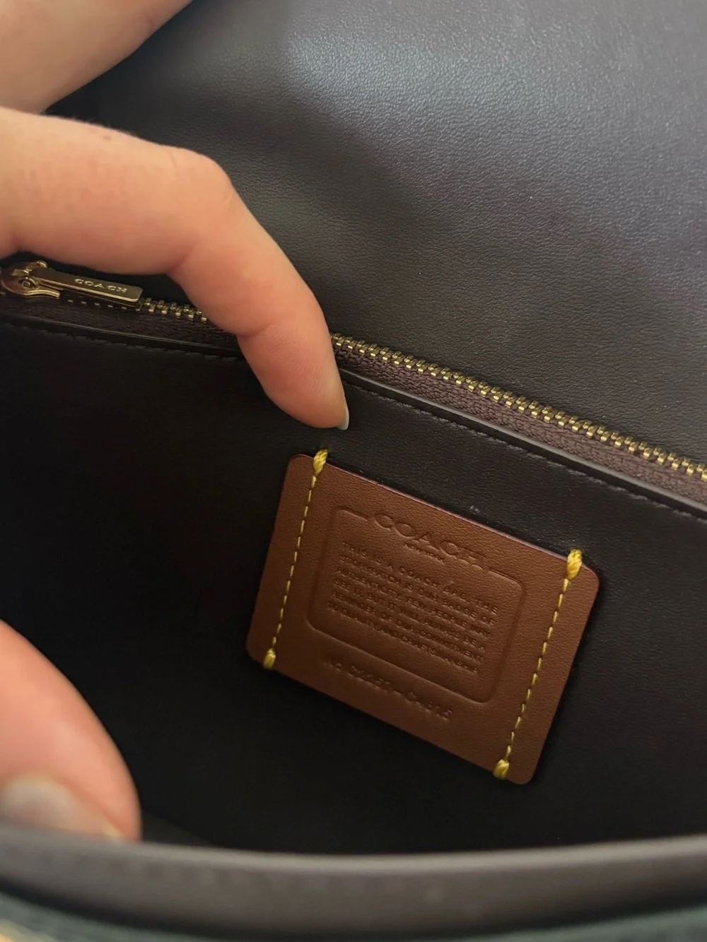 Coach compact pebbled